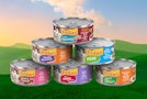 friskies wet cat food lineup on grass