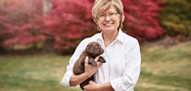 Terri Keller with a puppy 