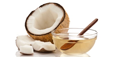 coconut oil with a hard coconut on the left